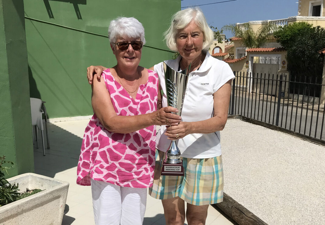 Pictured is Eileen Honey presenting Louvain Smith with the cup.